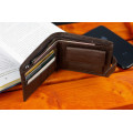 Шкіряне чоловіче портмоне на кнопці ST Leather ST104 Коричневе