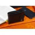 Шкіряне чоловіче портмоне на кнопці ST Leather ST104 Чорний