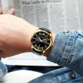 Чоловічий наручний годинник Curren 8365 Black-Gold з мінеральним склом та шкіряним ремінцем